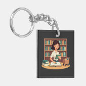 Gemütliches Mädchen liest Bücherregal Schlüsselanhänger (Vorderseite links)