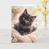 Gemütliches schwarzes Kätzchen auf gestrickter Dec Karte (Gelbe Blume)