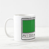 Generischer Oszilloskopspanntester an der Vorderse Kaffeetasse (Links)