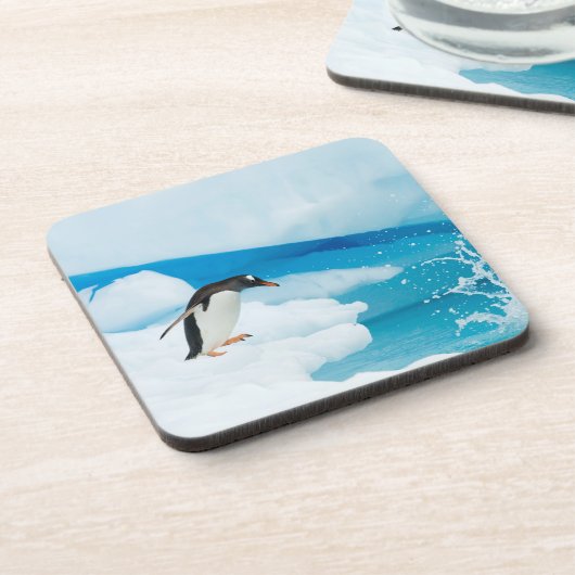 Gentoo Pinguin, Pygoscelis Papua, springt ab Getränkeuntersetzer (Linke Seite)