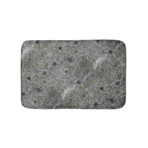 Geologie-grauer Granit-Felsen mit Moos Badematte