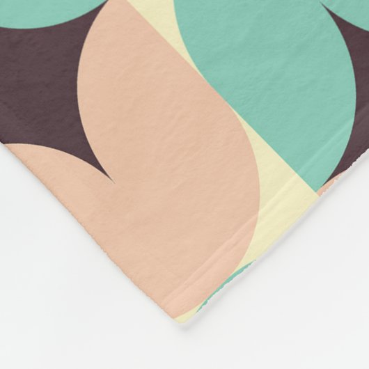 Geometric pattern of teal, beige, and black shapes fleecedecke (Ecke)