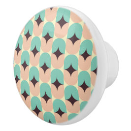 Geometric pattern of teal, beige, and black shapes keramikknauf