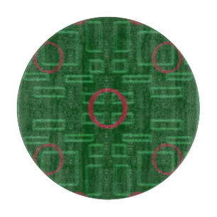Geometrische Boxen auf der grünen Trennwand Schneidebrett