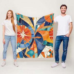 Geometrische Formen aus Hartglas in Orange und Bla Fleecedecke