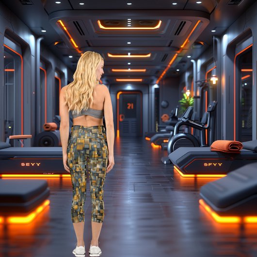 Geometrische Harmonie: Abstraktes Blau- und Goldmu Capri Leggings