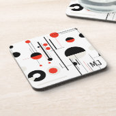 Geometrische, rote, schwarze Bauhaus-Formen auf we Getränkeuntersetzer (Linke Seite)