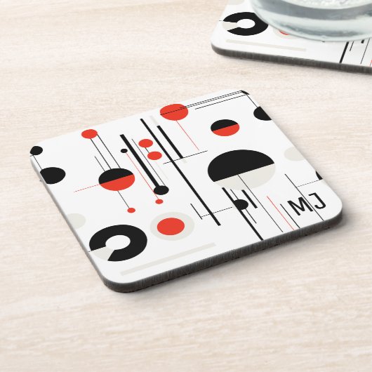 Geometrische, rote, schwarze Bauhaus-Formen auf we Getränkeuntersetzer (Linke Seite)