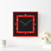 geometrische, rote und schwarze Uhr (Zuhause)
