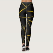 Geometrische schwarze Dreiecke, Goldlinien Leggings (Rückseite)