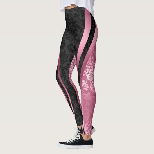 Geometrisches Design der schwarz-rosa Blumenmasken Leggings (Links)