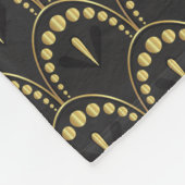 geometrisches Muster aus dunkelgrauem und goldenem Fleecedecke (Ecke)