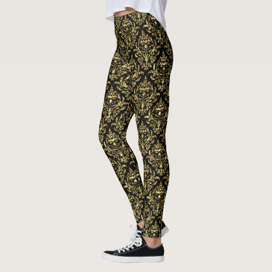 Geometrisches Muster aus schwarzen und goldfarbene Leggings (Links)