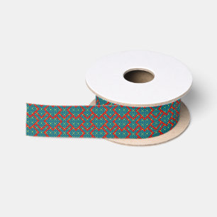 Geometrisches Muster mit blauen Herzen, rot umrand Satinband