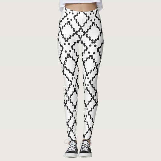 Geometrisches, schwarz gepunktetes Diamantformmust Leggings (Vorderseite)