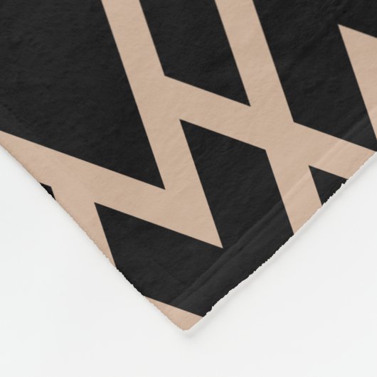 Geometrisches Schwarz-Tan-Muster Fleecedecke (Ecke)
