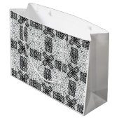 Geometrisches weißes und schwarzes Lochmuster Anna Große Geschenktüte (Rückseite Schrägansicht)
