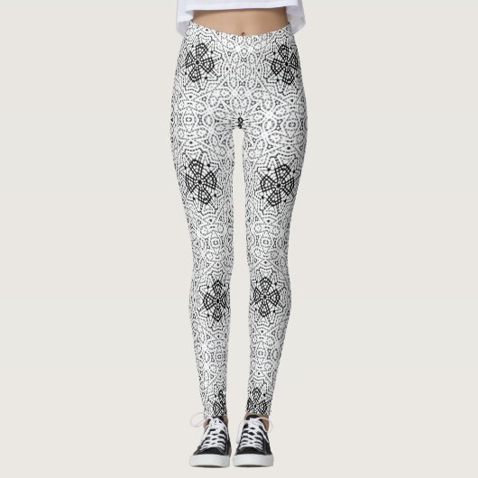 Geometrisches weißes und schwarzes Lochmuster Elsa Leggings (Vorderseite)