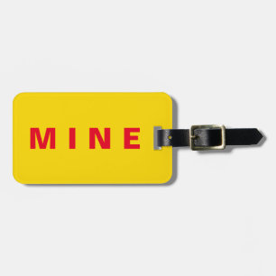 Gepäckanhänger mit dem Aufkleber "Mine"