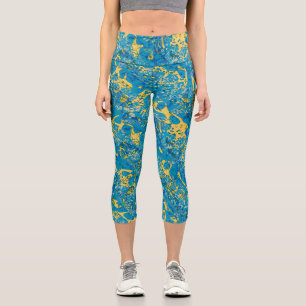Gepunktete grafische Abstraktion von Blau und Gelb Capri Leggings