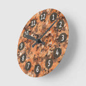 Gepunktete orange Granit-Felsen-Oberfläche mit Runde Wanduhr (Winkel)