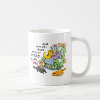 Gerade eine Katze kurz vom Sein eine verrückte Kaffeetasse