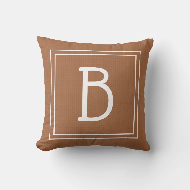 Gerahmtes Monogramm, anfänglich neutrales Braun un Kissen (Vorderseite)