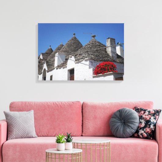 Geranium Blume und Trulli Häuser in Alberobello Leinwanddruck (Insitu (Wohnzimmer))