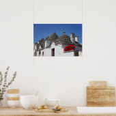 Geranium Blume und Trulli Häuser in Alberobello Poster (Küche)