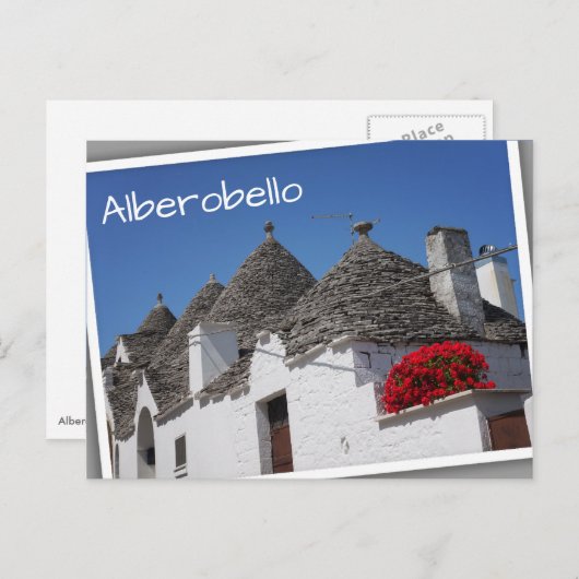 Geranium-Blume und Trulli-Häuser in Alberobello Postkarte (Vorne/Hinten)