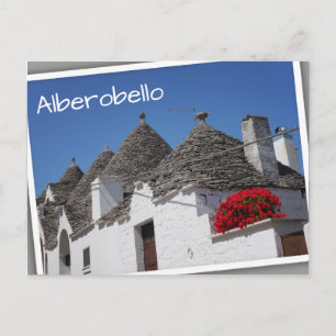 Geranium-Blume und Trulli-Häuser in Alberobello Postkarte