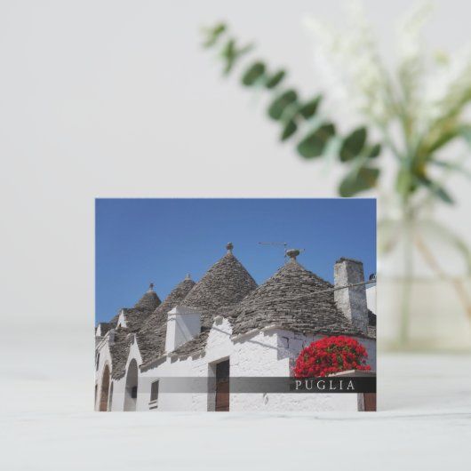 Geranium-Blume und Trulli-Häuser in Alberobello Postkarte (Stehend Vorderseite)