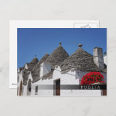Geranium-Blume und Trulli-Häuser in Alberobello Postkarte (Vorne/Hinten)