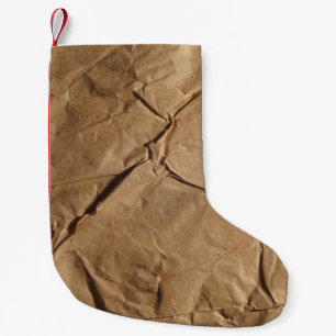 Gerecycelt Papier: Öko-freundliche Textur. Kleiner Weihnachtsstrumpf