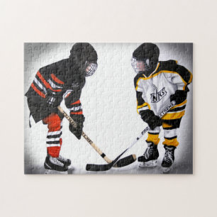 geringe Hockeyspieler am Face-Offpuzzlespiel Puzzle