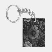 Gerötete Farbtöne der grauen Blüte Schlüsselanhänger (Vorderseite links)