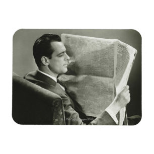 Geschäftsmann, der die Zeitung liest Magnet
