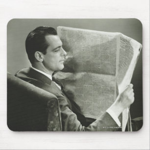 Geschäftsmann liest die Zeitung Mousepad