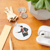 Geschäftsmann mit Zeiger in einem Anzug Schlüssela Schlüsselanhänger