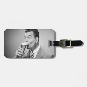 Geschäftsmann-trinkendes Bier Gepäckanhänger