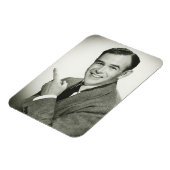 Geschäftsmann zeigt magnet (Linke Seite)