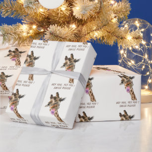 Geschenkpapier mit lustiger Girrafe und einprägsam