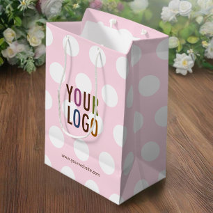 Geschenktasche mit Punkten in Rosa mit Firmenlogo Mittlere Geschenktüte