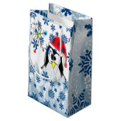 Geschenktasche Weihnachtspenguin Kleine Geschenktüte (Rückseite Schrägansicht)