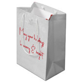 Geschenktüte 'Fröhliche Feiertage' mit roten Schle (Rückseite Schrägansicht)