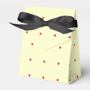 Geschenktüte mit roten Punkten und schwarzer Schle Geschenkschachtel