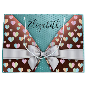 Geschenktüte mit Schleife und Herz-Sprenkelung