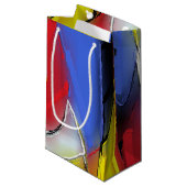 Geschenktüte rot, gelb, schwarz und blau (Vorderseite Schrägansicht)