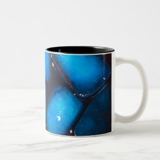 Geschmolzenes blaues Eis Zweifarbige Tasse