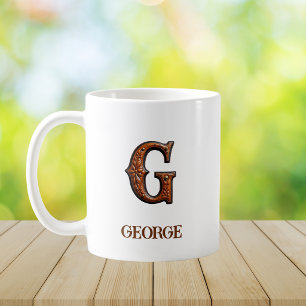 Geschmücktes westliches Lederinitial-Monogramm G Kaffeetasse